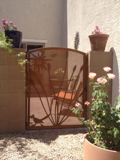 Gate with ocotillo and roadrunner